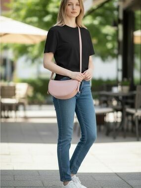 ELARA CONVERTIBLE BAG with adjustable strap.